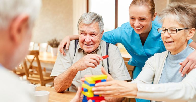 Husband and his wife with specialist carer in the Southwest